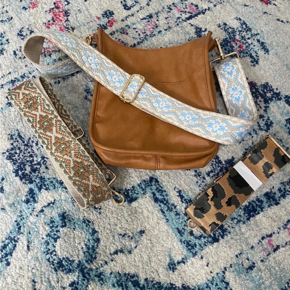 Adorned Brown Leather Crossbody Bag with Patterned Straps